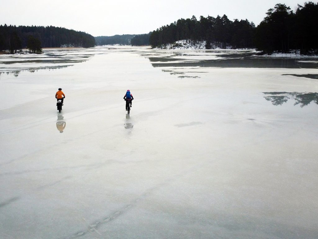 Riding across a frozen lake in Sweden