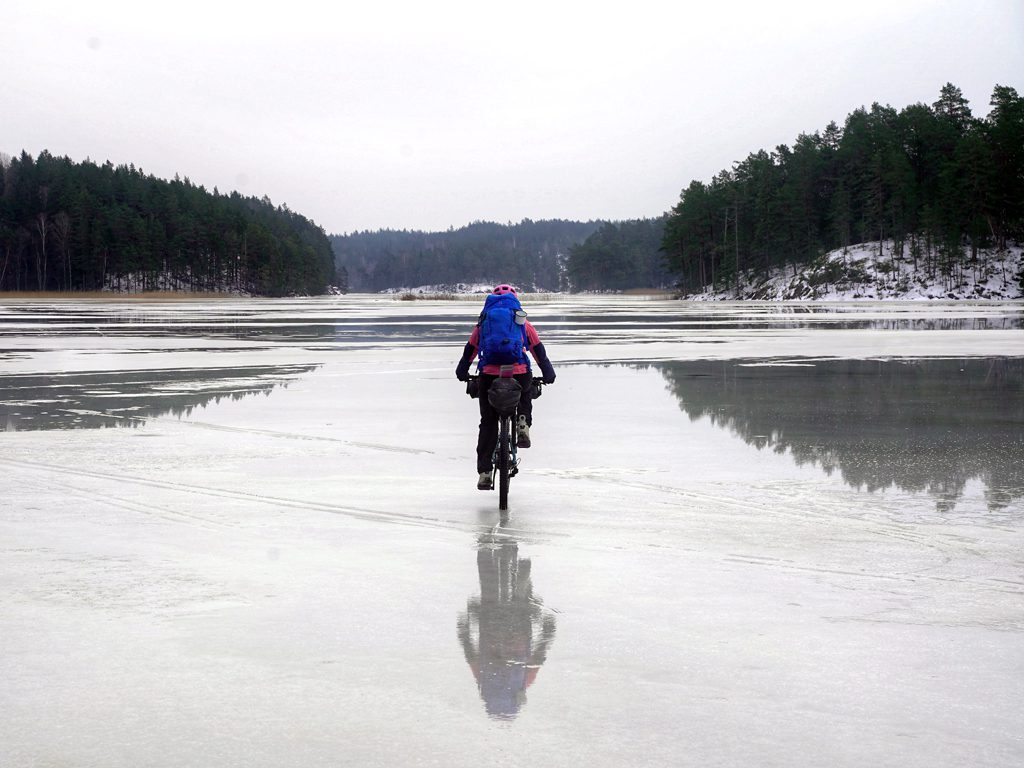 Riding across a frozen lake in Sweden