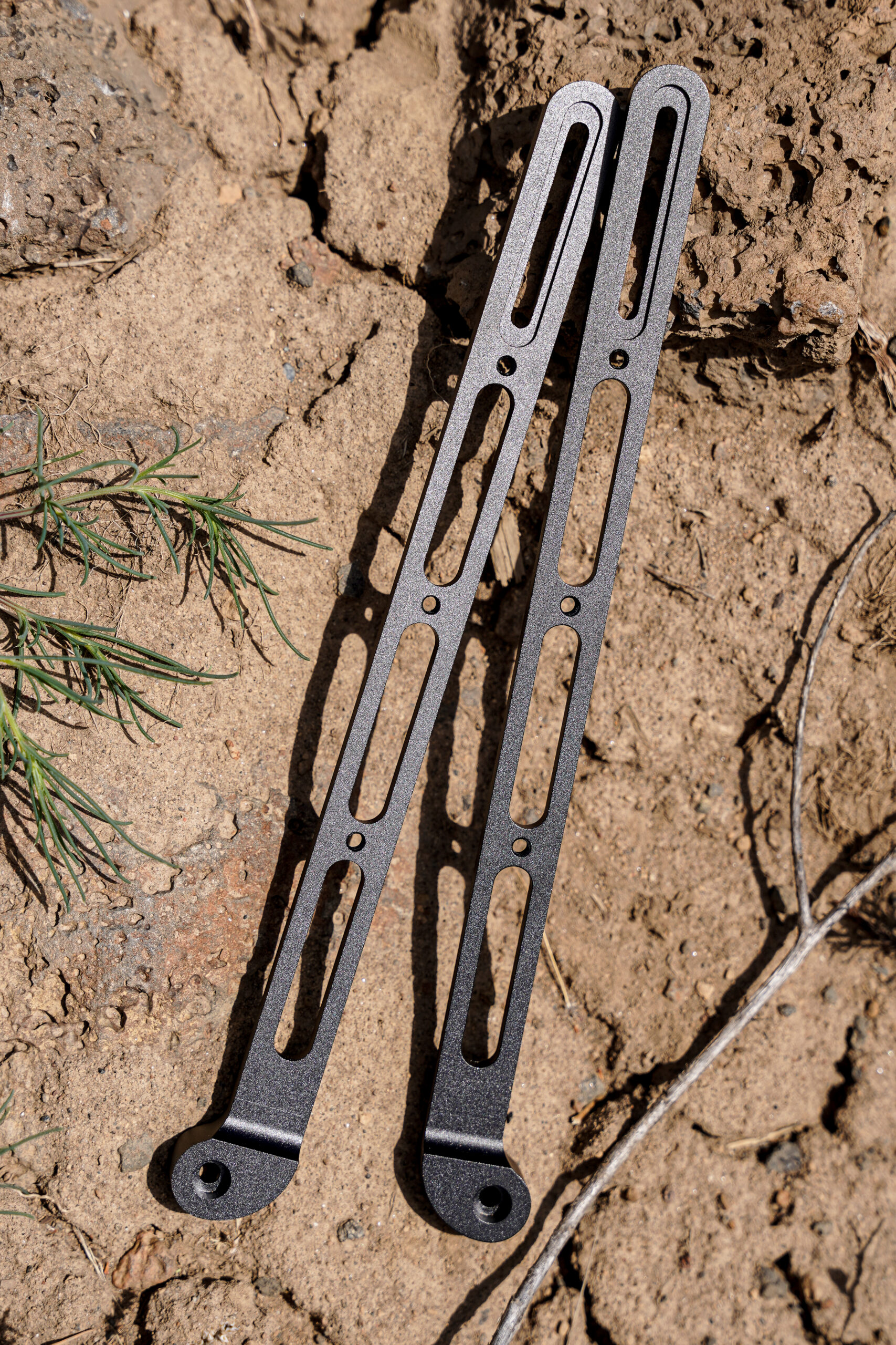 Axle Pack pair, laying in the dirt.