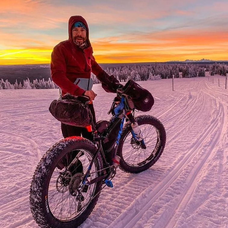 Kurt and his fat bike, bikepacking in the Alaskan snow