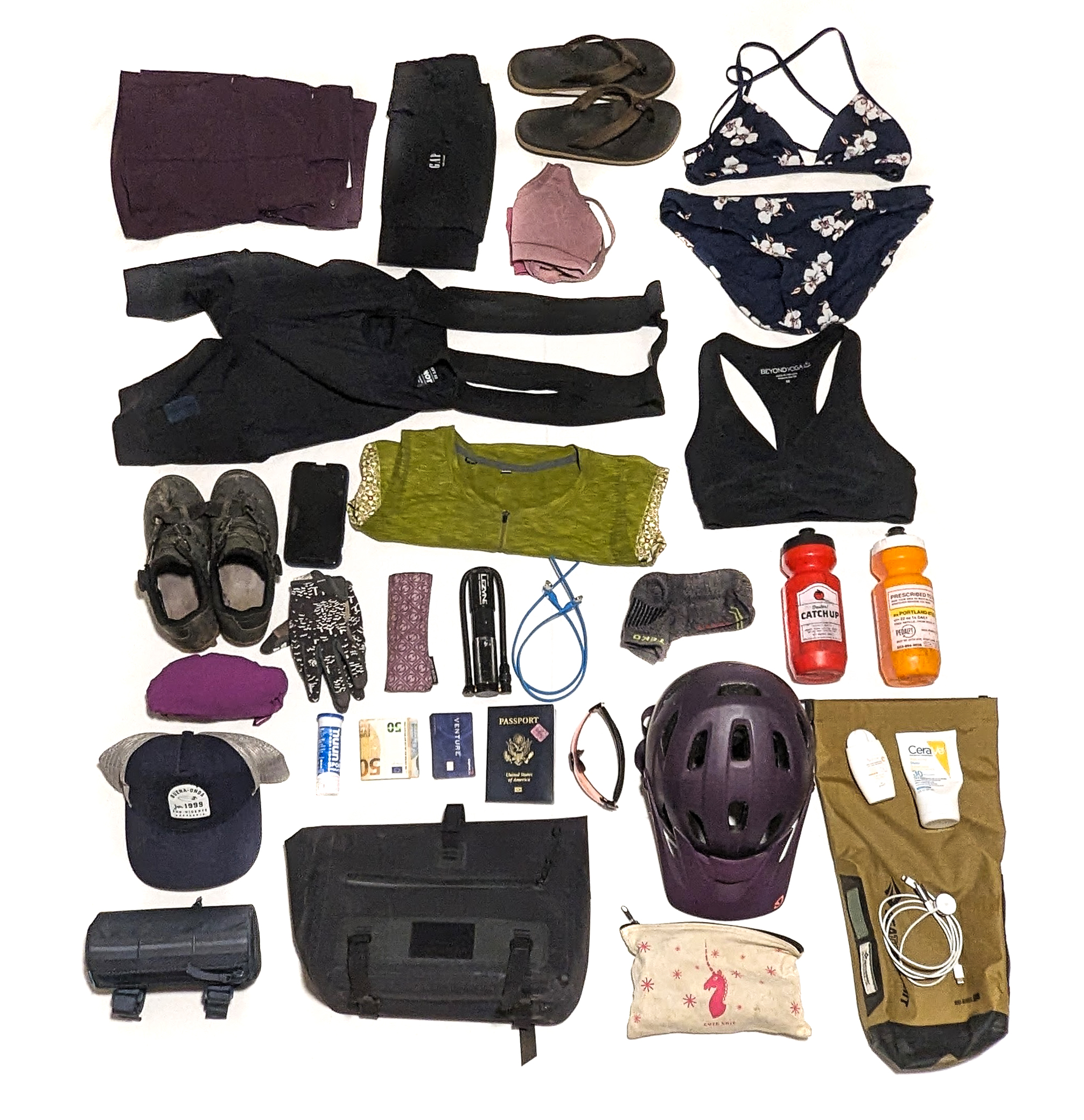 Katy's bikepacking gear the she rode with in Girona, Spain, laid out in a grid