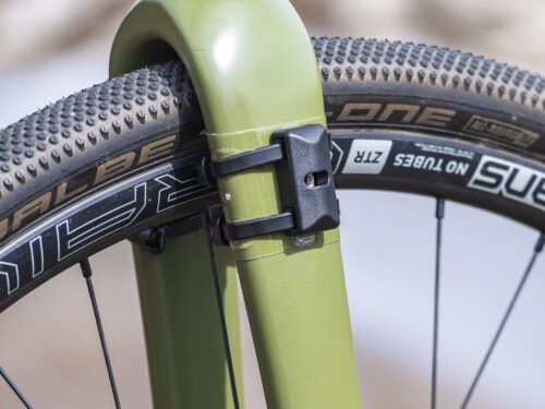 Old Man Mountain mounting puck on a gravel fork. An alternative mounting option for bikes without eyelets.