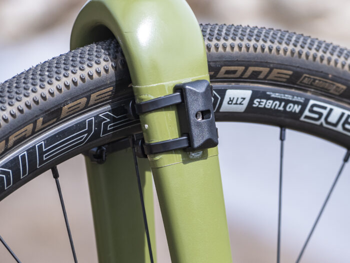 Old Man Mountain mounting puck on a gravel fork. An alternative mounting option for bikes without eyelets.