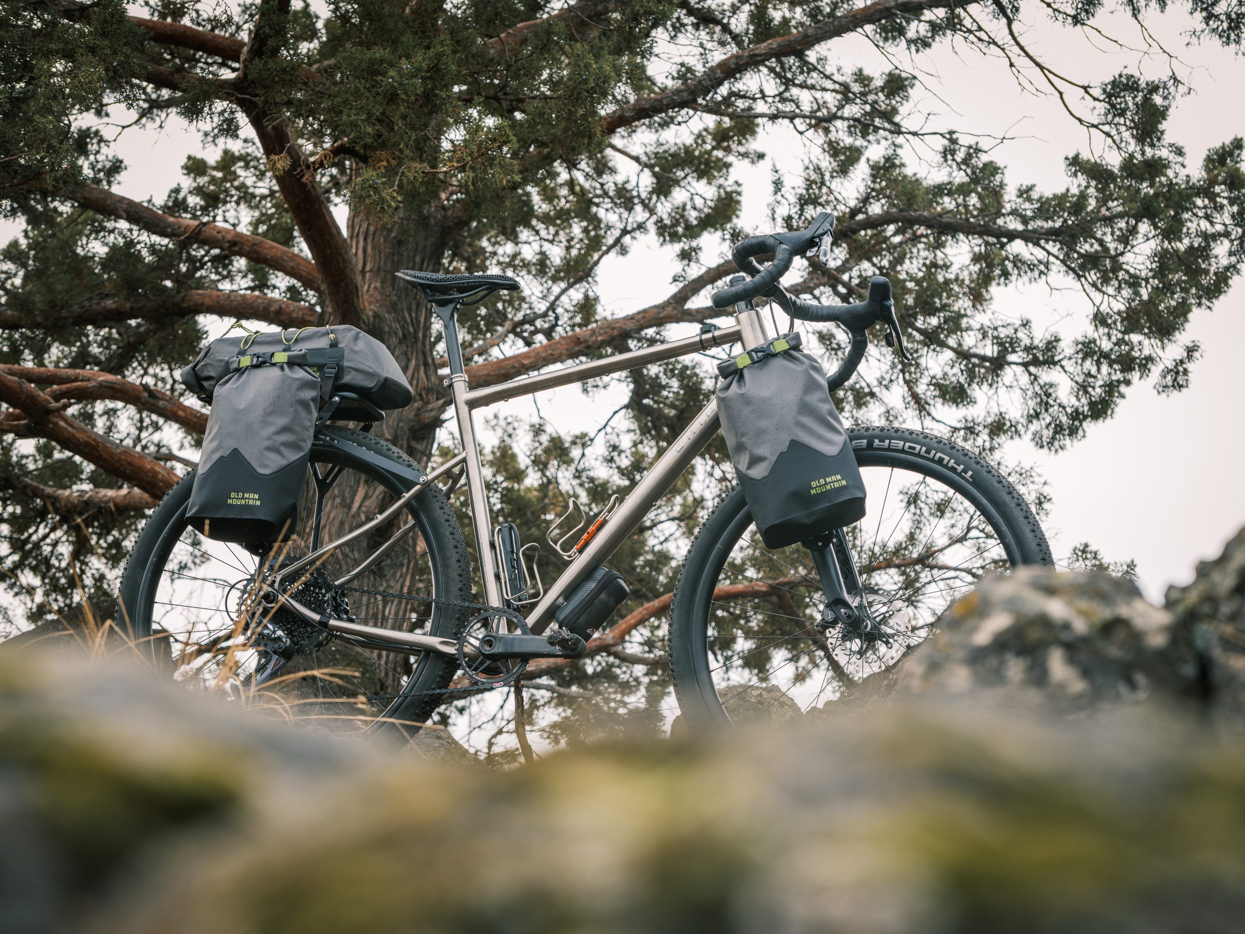 Hemlock fork pack bikepacking bags with FLIP Cages. Bikepacking Cargo cages with a removable foot and compatible with quick detach panniers and bikepacking bags.