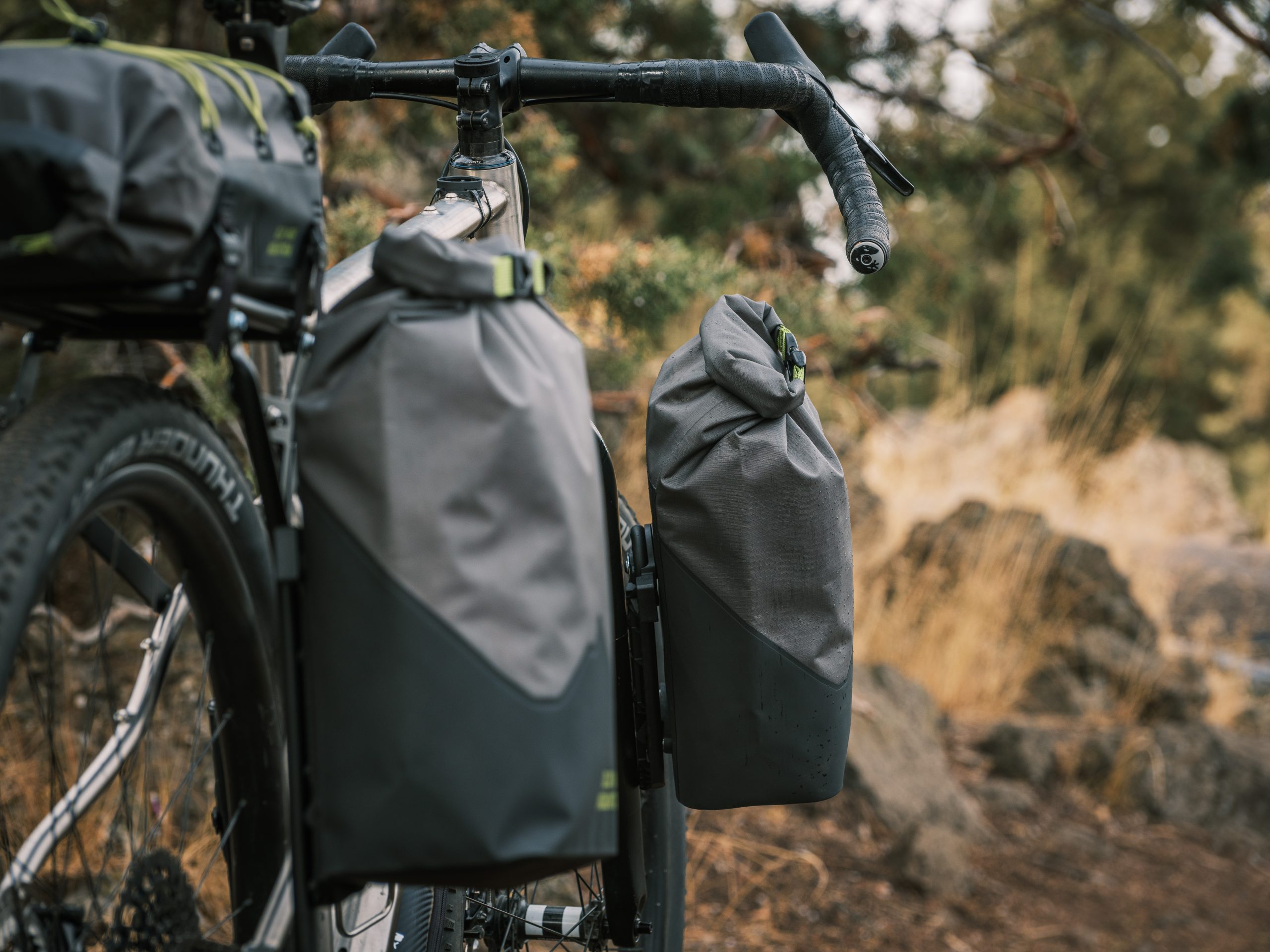 Chiru_New-Products-48 Hemlock w/ FLiP mini panniers are 7 liter bikepacking mini panniers mounted to a gravel fork and a gravel bikepacking rack on a Chiru gravel bike.