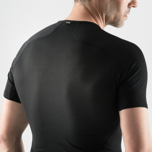Model wearing Gorewear Men's Base Layer