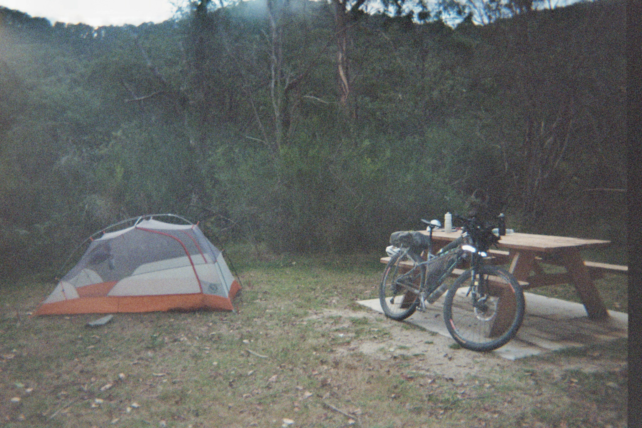 Lorenz's bike and tent in camp.