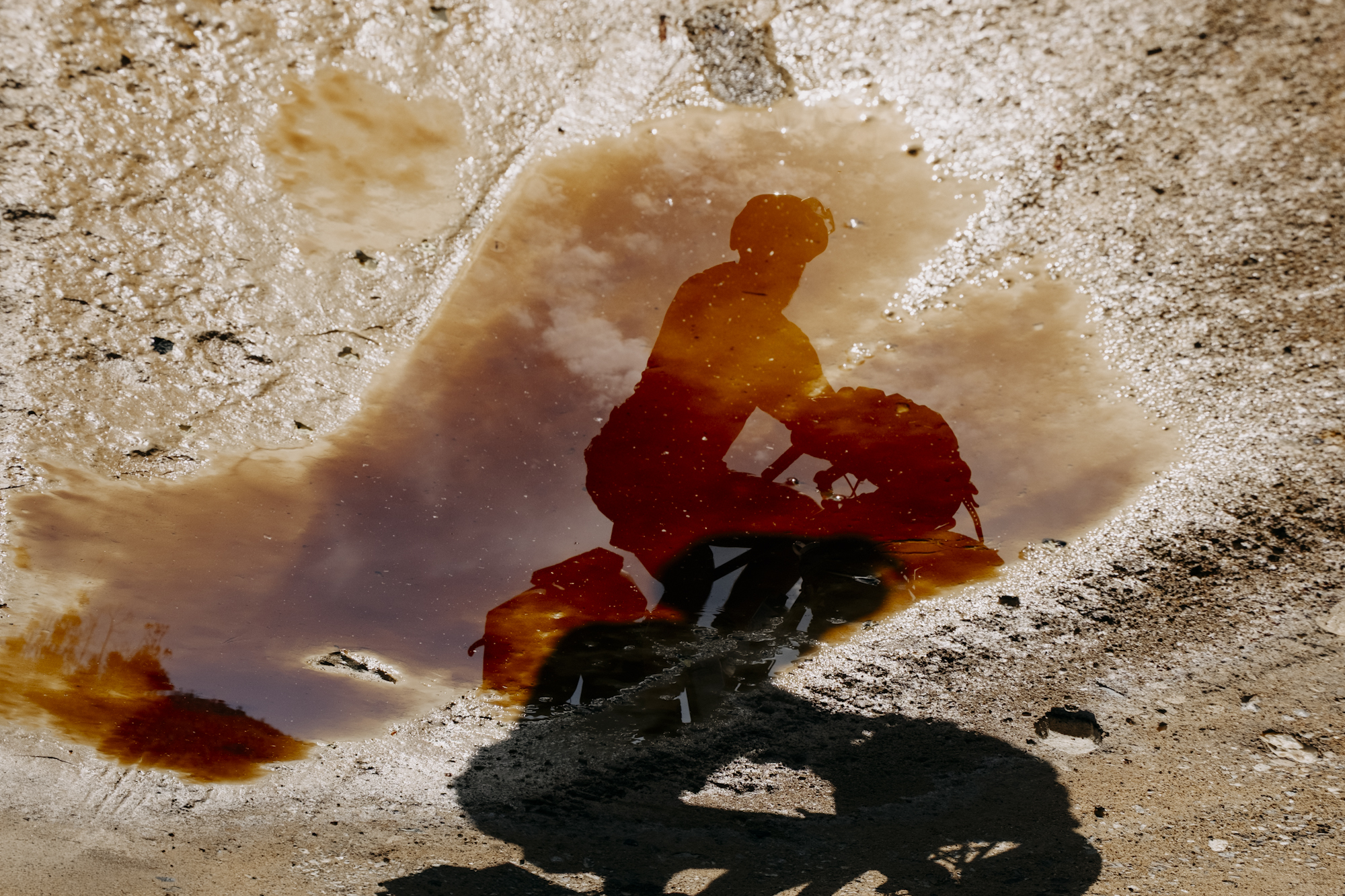 Angustias_Tour_TomasMontes-10 Reflection of Javi in a puddle.