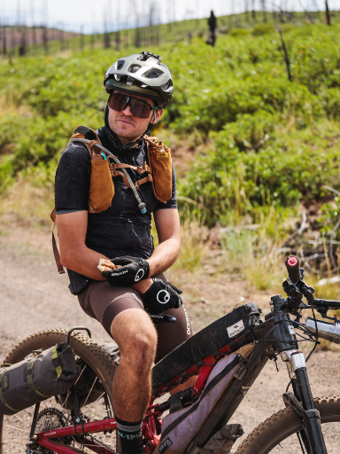 _Q9A4256-CROP Alex pausing for a snack on the course.