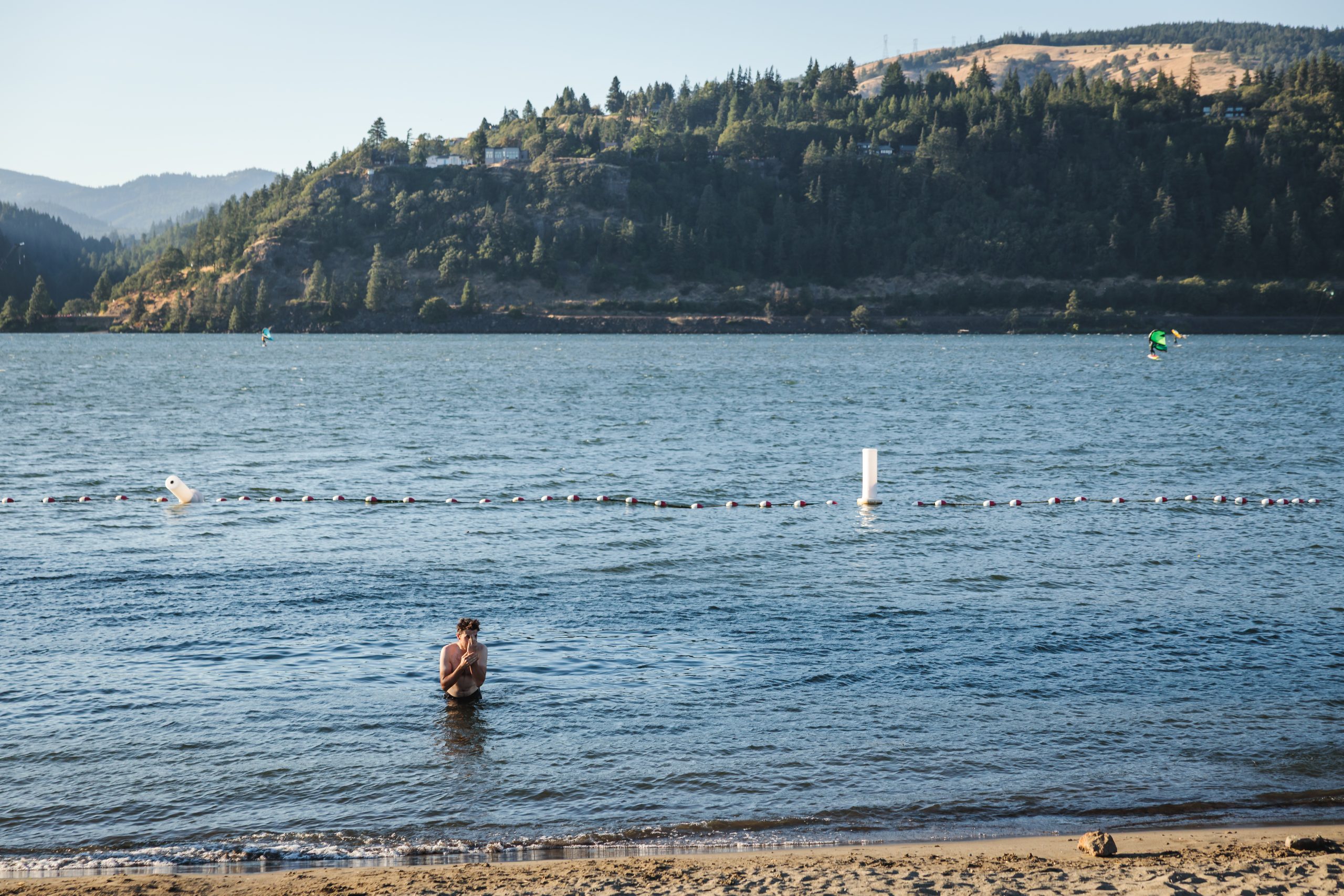 Alex swimming in the Colombia River after the race